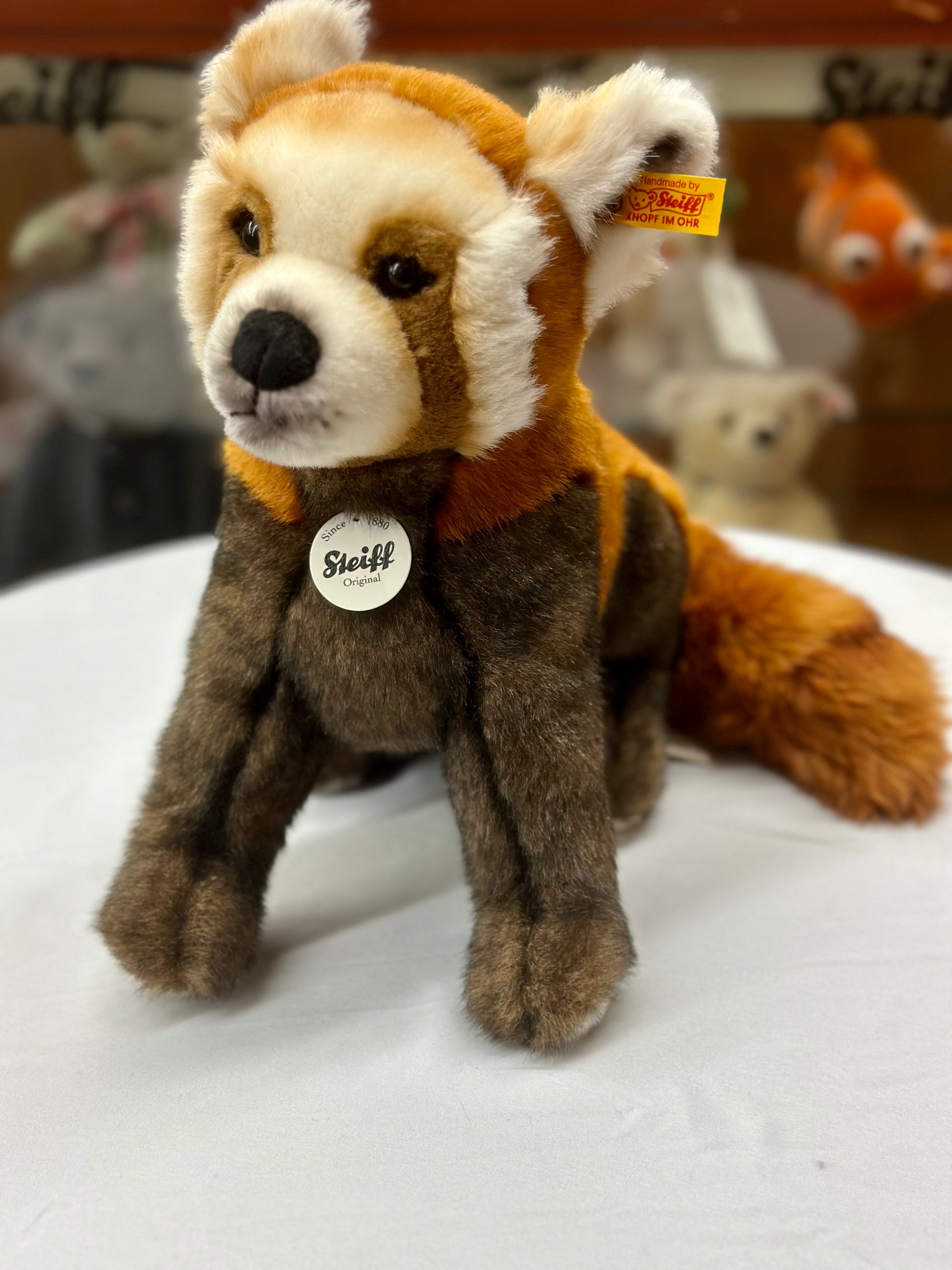 Steiff red panda button in ear