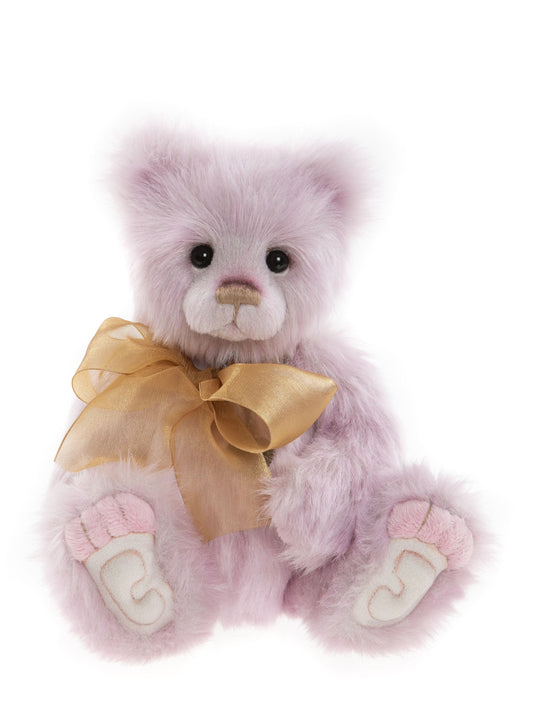 Pink plush Charlie Bear with gold ribbon bow