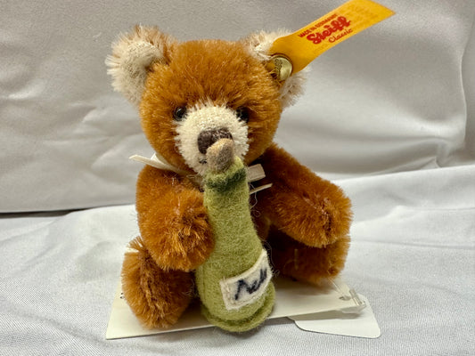 Steiff mohair plush teddy bear with champagne bottle